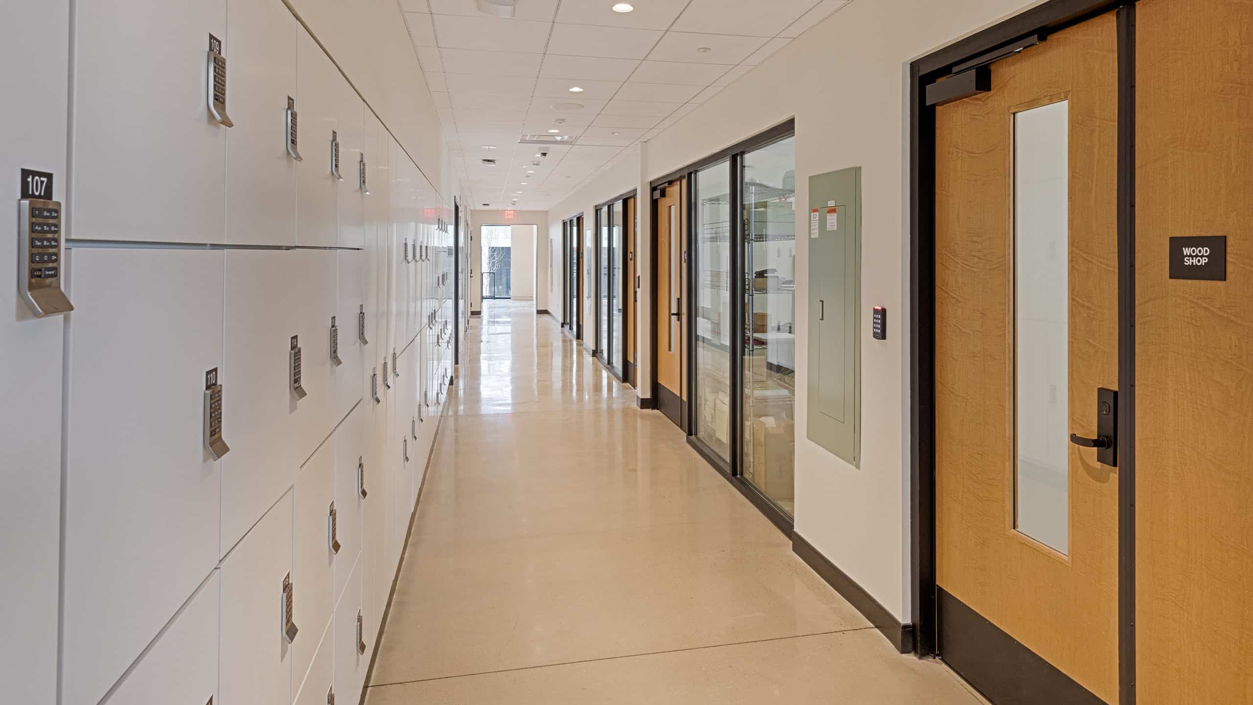 Hallway lined with lockers and doors